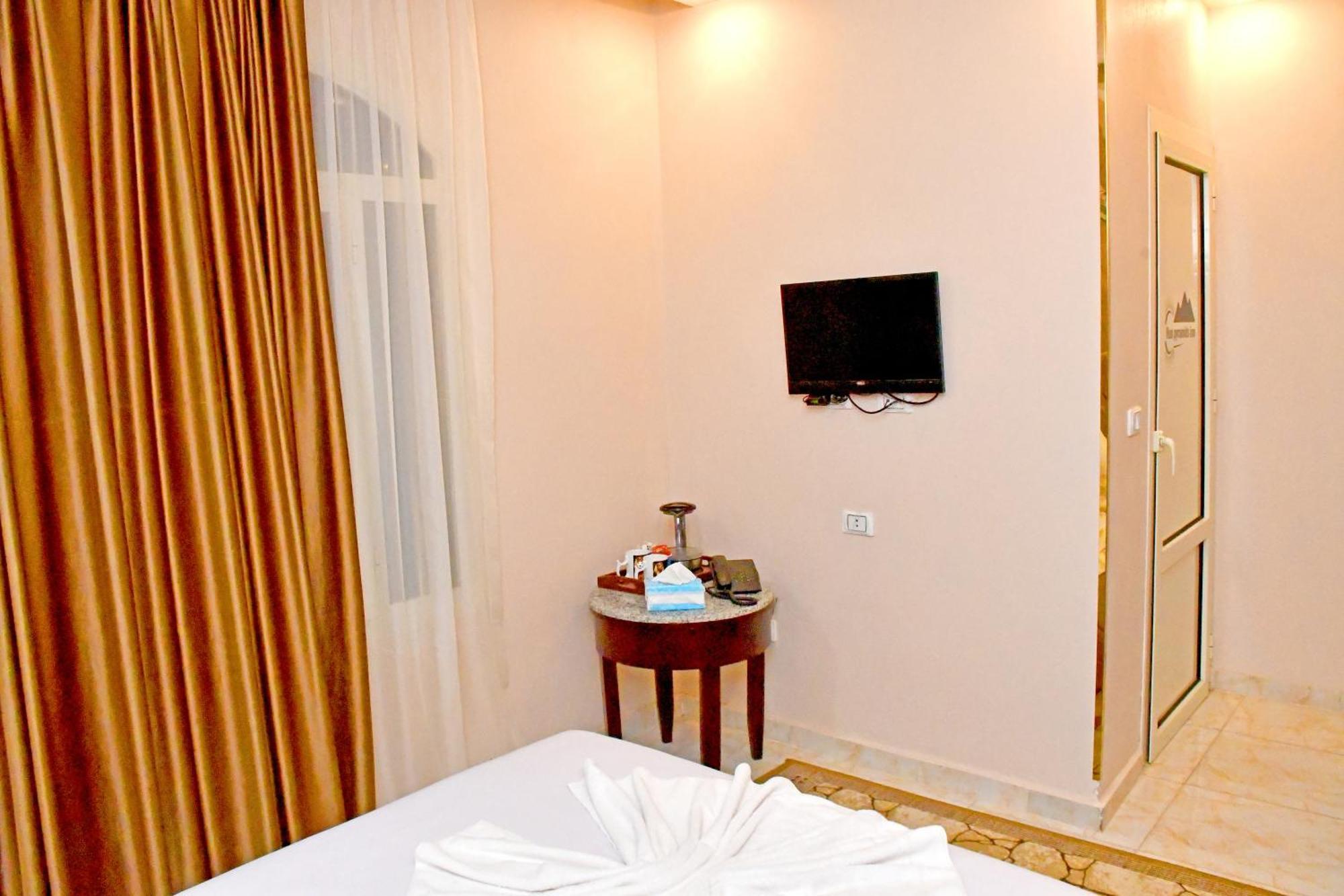 Nun Pyramids Hotel Kafret el-Gabal Chambre photo