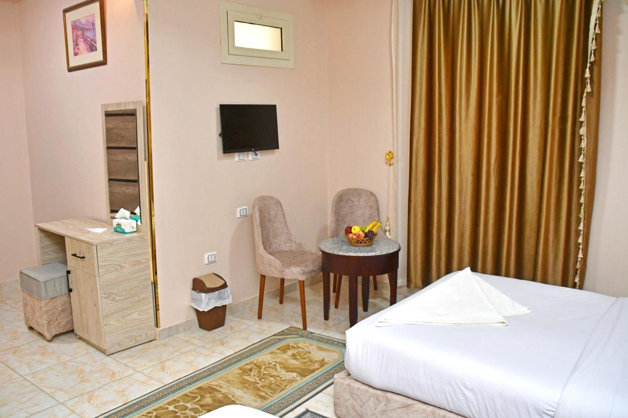 Nun Pyramids Hotel Kafret el-Gabal Chambre photo