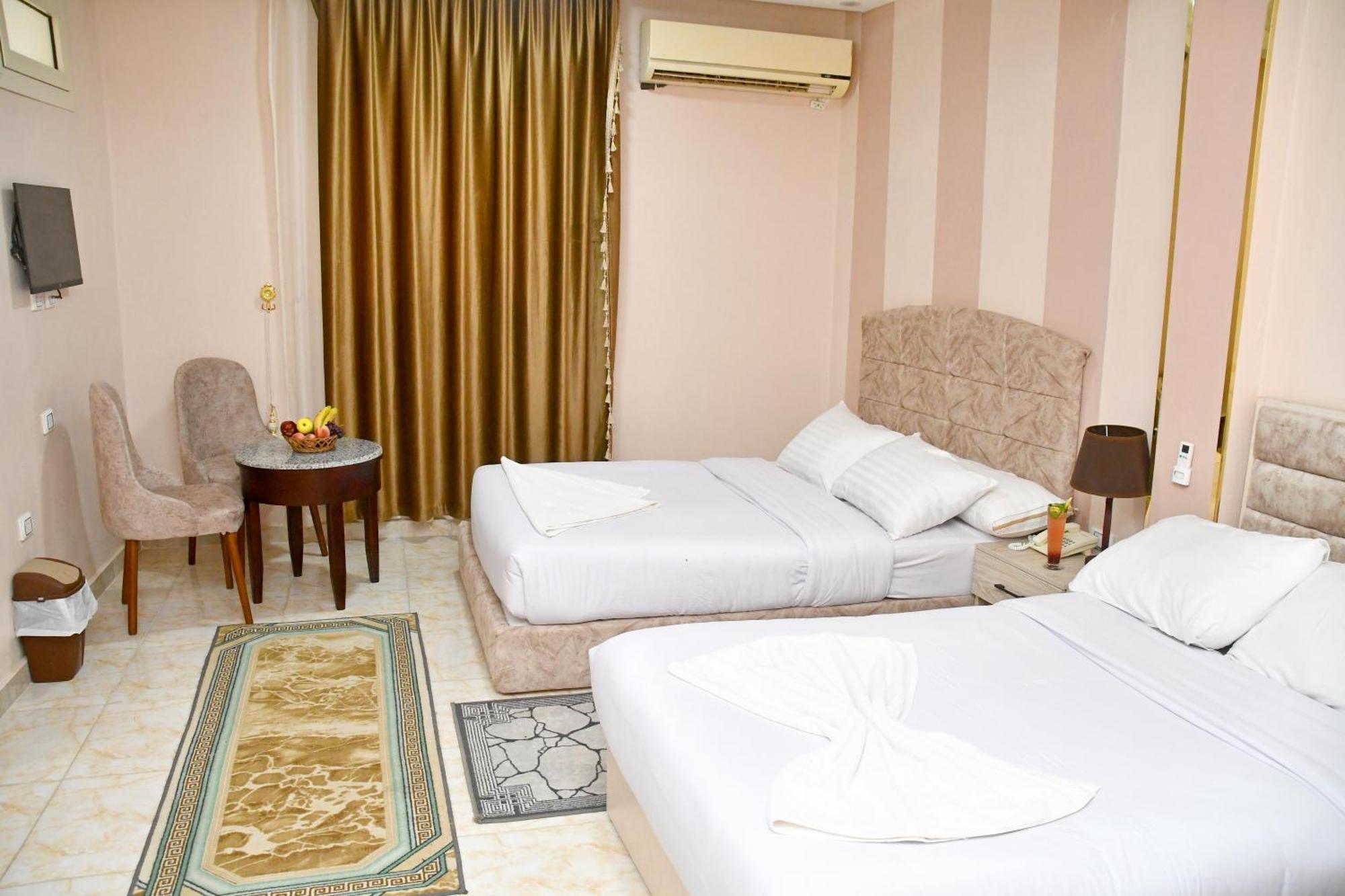 Nun Pyramids Hotel Kafret el-Gabal Chambre photo